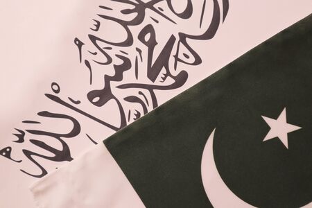 Concept showing of Pakistan and Taliban deal preocess showing with flags