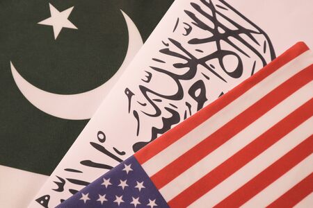 Concept showing of US, Pakistan and Taliban deal preocess showing with flagsの写真素材