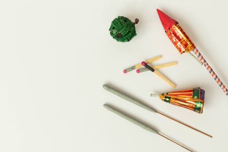 Different types of Diwali Firecrackers on isolated background with copy space