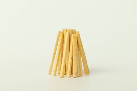 Brown sticks arranged like Campfire on isolated backgroundの写真素材