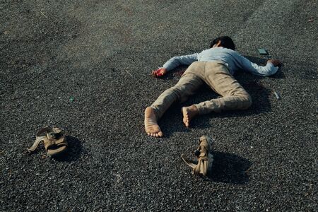 Concept of Crime scene , victim dead body laying on Roadの写真素材