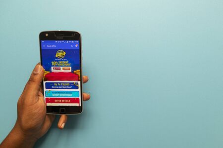 Maski, India - October ,6 2019 - Close up of hands Using Flipkart App showing Big billion Days on...
