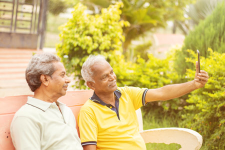 Senior man using VR google glass for exercise, Outdoor - Fitness concept using New technologies by...