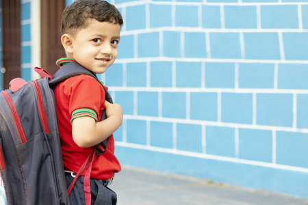 Back to school. Cute asian child girl with backpack running and going to school with funの写真素材