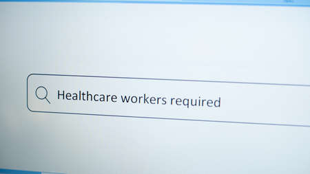 Concept of healthcare workers requirement during  pandemic, showing by searching on internet.の写真素材