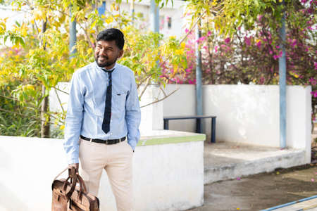 businessman or employer waiting for public transportation, taxi or cab while going for office -...