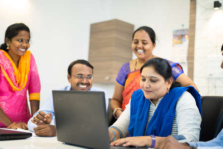 happy smiling Group of corporate employees during meeting at office - concept of teamwork,...