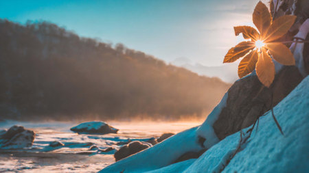 Beautiful winter landscape with a frozen river and the sun on the horizonの素材