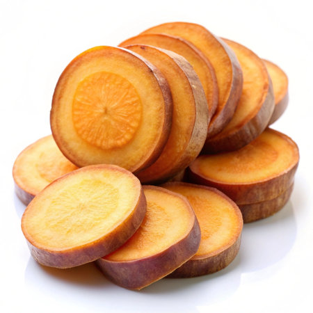 Slices of sweet potato on a white background, close-upの写真素材
