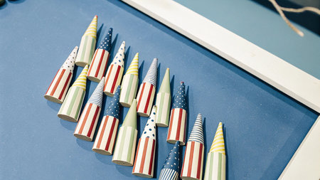 Party hats on a blue table in a children's toy store.の写真素材