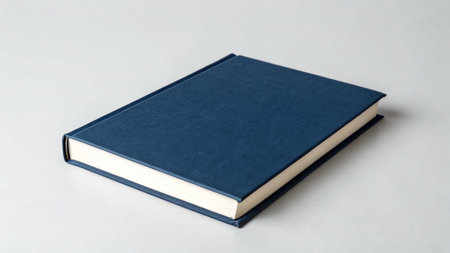 Blue book isolated on white background. Close-up of book.の写真素材