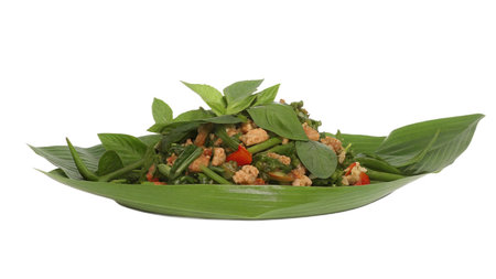 Thai food, stir-fried pork with basil leaf on white backgroundの写真素材