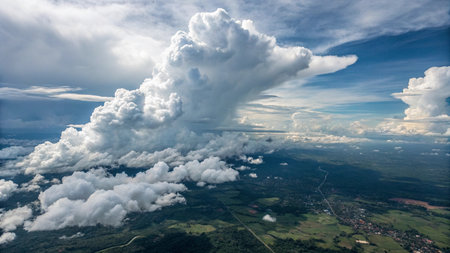 Aerial view of cloudscape with blue sky and white clouds.の写真素材