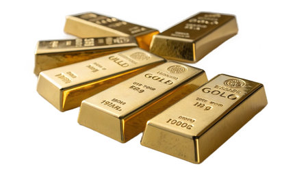 Stack of gold bars isolated on a white background. Studio shot.