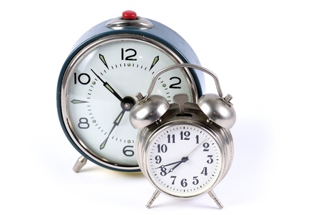 Blue and silver alarm clock on a white background