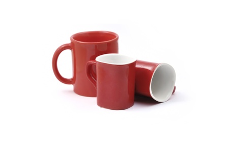 Three red empty cups on a white backgroundの写真素材