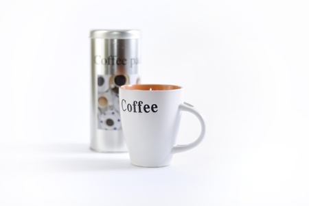 A cup of caffee with a coffee box isolated on whiteの写真素材