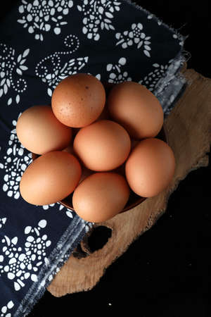 eggs on a black background in a studio shot