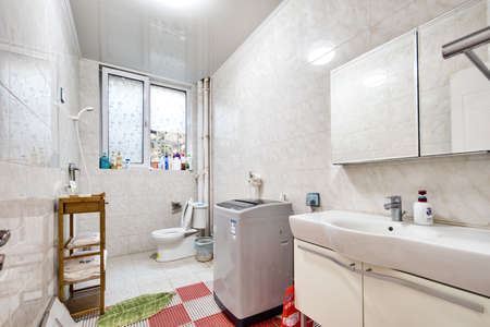 interior room apartment. standard repair decoration in hostel. bathroom, sinkration elements, toilet