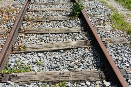 Old train track with wood boardsの写真素材