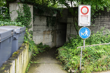 scary underpass with street signの写真素材
