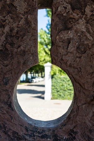 wall medievil concrete hole look throughの写真素材