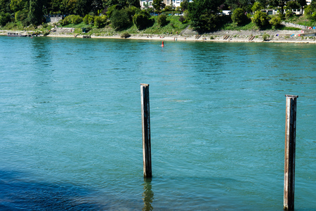 wood construction in rhine river with blue waterの写真素材