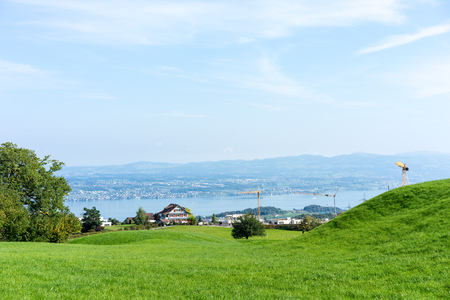 landscape of lake zurich in summer from hiking trail switzerland tourism travel destination nature blue skyの写真素材