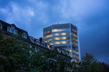 UBS Bank Office Building in Zurich, Switzerland at Night with Sky and Clouds, EDITORIAL USE ONLY