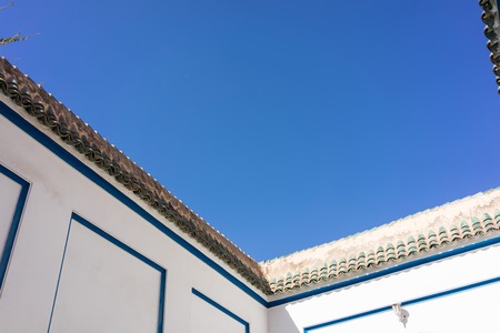 mediterranean house corner with blue skyの写真素材