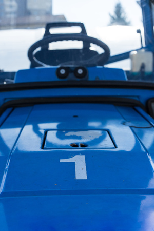 Blue tractor cabin front view with number oneの写真素材