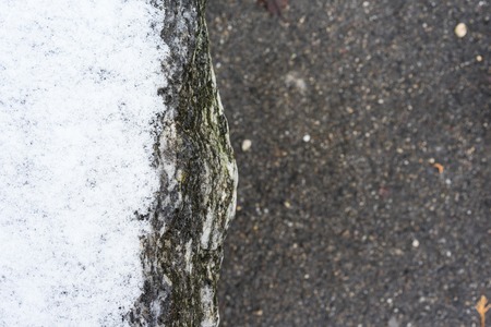 snow and concrete ground close up viewの写真素材