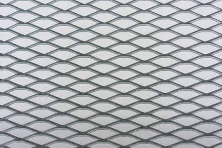 metal fence with snow backgroundの写真素材