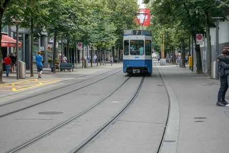 Street Scene with Tram and People at Bahnhofstrasse in Zurich, Switzerland, 17.06.2018のeditorial素材