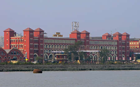 View of historical Howrah railway station building from across the Hooghly river in Kolkata.のeditorial素材