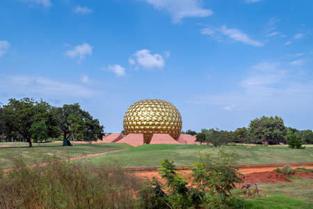 Golden dome of Matrimandir - an edifice of spiritual significance for practitioners of Integral yoga, in the center of Auroville ,Pondicherry,India.のeditorial素材