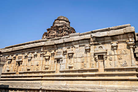 Carvings on the wall of ancient Vijaya Vitthala temple in Hampi, Karnataka, India.の写真素材
