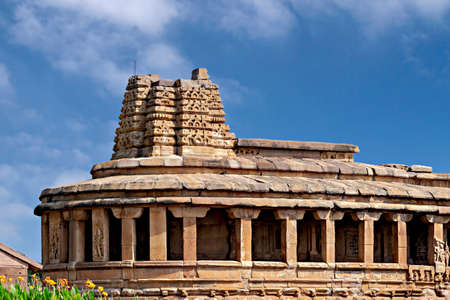 Durga temple in Aihole, Karnataka, India. The temple is constructed in the sixth century. It is built in the Buddhist chaitya style but it has a corridor running on all three sides.の写真素材
