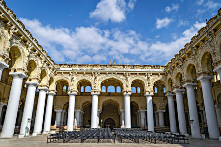 Interior view of Nayakkar palace with blue clouds background in Madurai.のeditorial素材