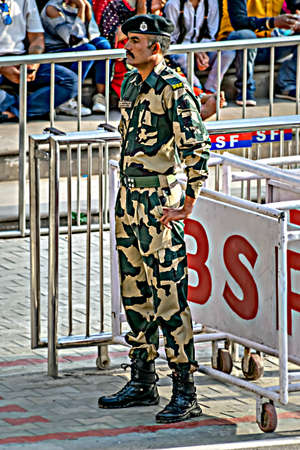 Amritsar,Punjab,India-April 14th, 2019: Border Security Force soldier in uniform, standing guarding the border with Pakistan during "Beating the Retreatâ ceremony ceremony.のeditorial素材