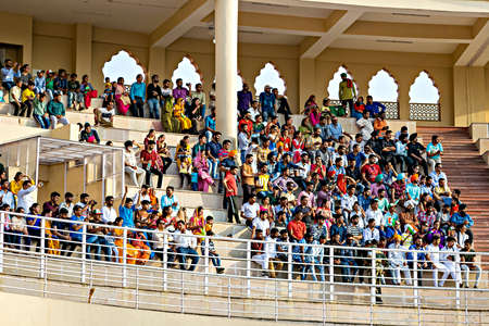 Amritsar,Punjab,India-April 14th, 2019: Cheerful crowd encouraging the soldiers performing "Beating the Retreatâ ceremony at Wagah border.のeditorial素材