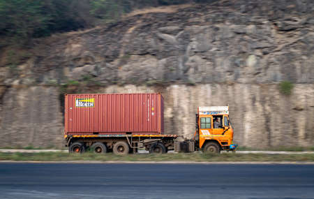 Pune, Maharashtra, India - January 1st, 2022 : Big container on trailer , speeding towards Mumbai on...