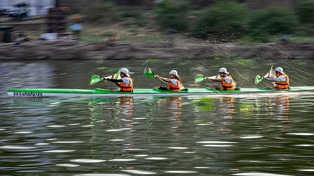Pune, Maharashtra, India-April 3rd, 2022:Intentional camera movement, pan image of speeding kayak...
