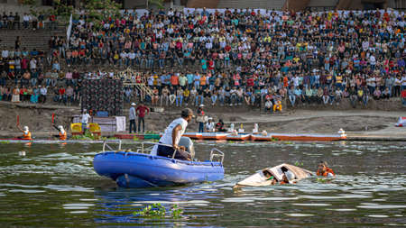 Pune, Maharashtra, India-April 3rd, 2022: Rescue boat reaches to save participants of collapsed...