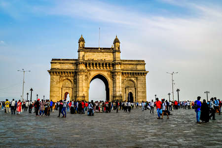 Mumbai, Maharashtra, India-April 19th, 2022: Crowd in front of Gateway of India historical monument...
