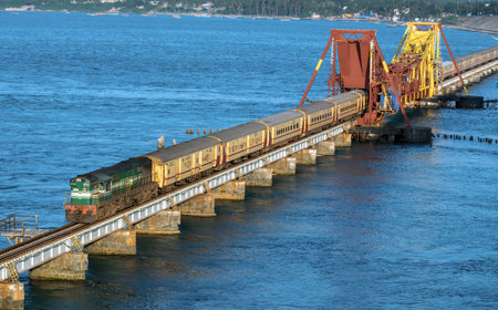 Rameswaram, Tamil Nadu, India- January 29th, 2020: Indian Railways passenger train crossing historical , 2 kms long Pamban sea bridge.のeditorial素材