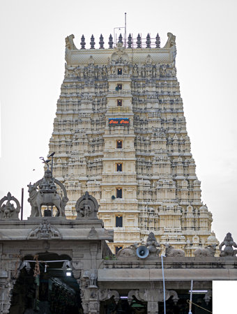Northern gate of Ramanatha Swamy temple with nice blue colored sky background, in Rameswaram, Tamil Nadu, India. Text in local tamil language means Gods name'Shiva Shiva'.の写真素材