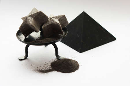 bubbling bombs for a relaxing star-shaped bathtub with black clayの写真素材