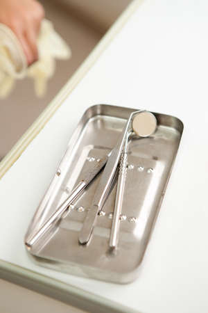 a tray with dentist's instruments in the clinic office