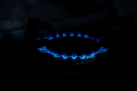 Burning gas burner, blue flame of household gas appliancesの写真素材